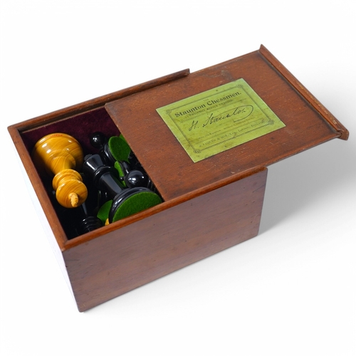 320 - An early 20th century boxed J. Jaques & Son Staunton chess set, ebony and boxwood pieces, contained ... 