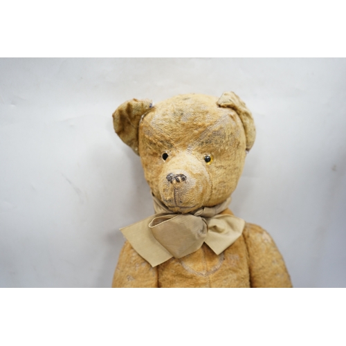 324 - A 1930s jointed Teddy bear, 53cm.  Condition - poor