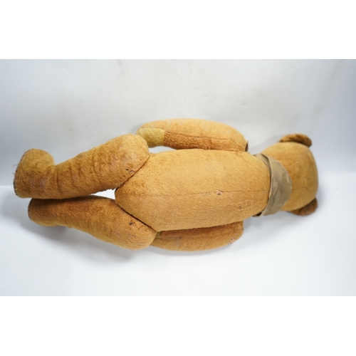 324 - A 1930s jointed Teddy bear, 53cm.  Condition - poor