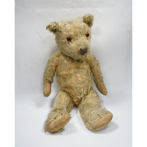 325 - A 1930s English Teddy bear, gold mohair plush and glass eyes, 49cm.  Condition - fair