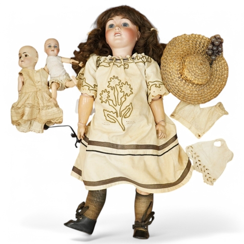 328 - An Al & Cie, Ed Tasson Limoges bisque doll, with fixed glass eyes, open mouth and pierced ears, join... 