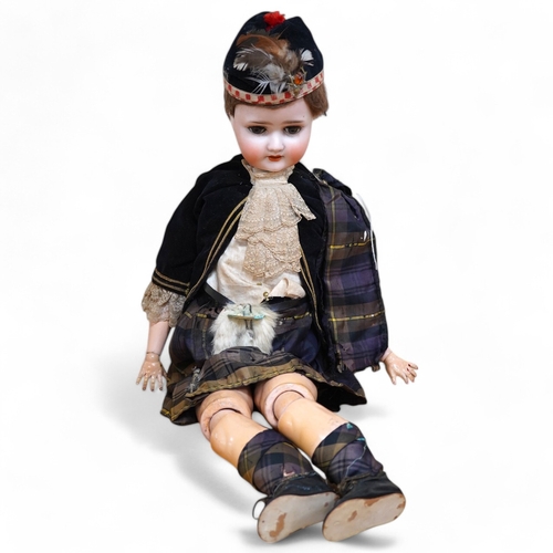 331 - A Schoenau & Hoffmeister bisque doll, mould 1909, with sleeping eyes and open mouth, jointed wood an... 