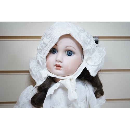 334 - A. Jules Steiner bisque doll, closed mouth and fixed glass eyes, cloth body with jointed bisque lowe... 