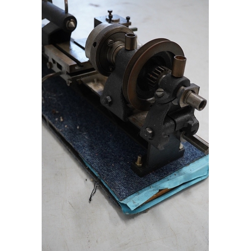 338 - A model engineering workshop lathe, by E.W. Stringer, length 60cm. Condition - fair, some surface ru... 