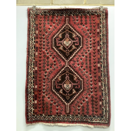 34 - A Hamadan red ground rug, 150 x 108cm together with a North West Persian style rug and an Afghan run... 