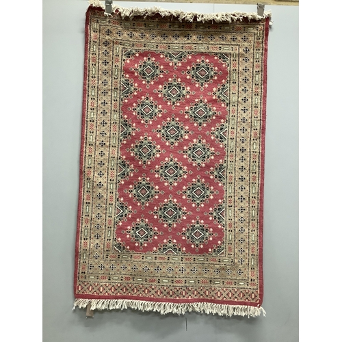 34 - A Hamadan red ground rug, 150 x 108cm together with a North West Persian style rug and an Afghan run... 