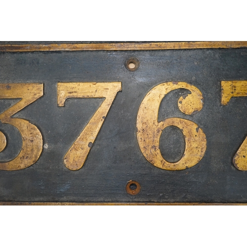 355 - A cast iron GWR locomotive cab side number plate for a Class 57xx 0-6-0PT locomotive, 3767, built in... 