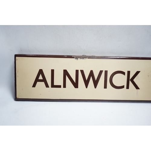 361 - A London & North Eastern Railway enamel lamp tablet for Alnwick. Condition - fair to good.