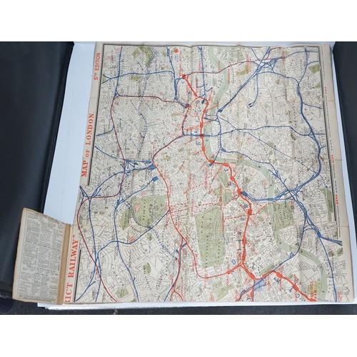 363 - A c.1895 The District Railway Map of London, 5th Edition, folding map on linen with paper covers. Co... 