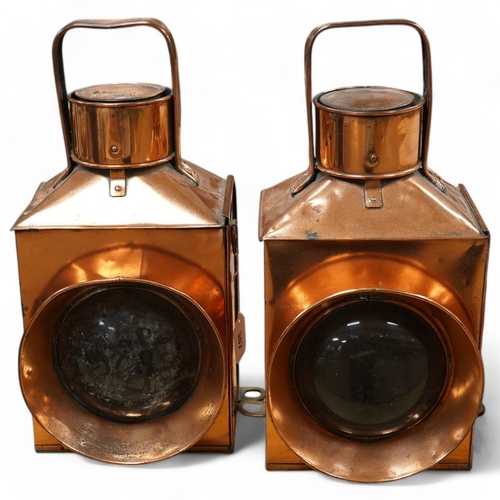 367 - A pair of copper marine or railway oil lamps (missing burners and reservoirs), 44cm high. Condition ... 