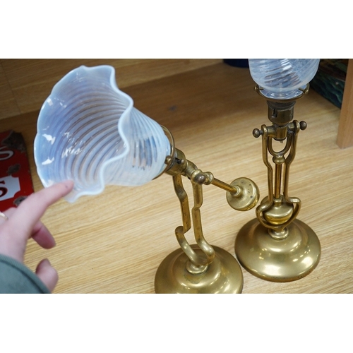 372 - A pair of brass Pullman lamps with gimbal stems and Vaseline glass shades, modelled for wall mountin... 