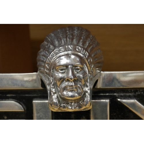 373 - A 1960s Guy Motors aluminium truck radiator badge, bearing the legend; Feathers in Our Cap, 32.5cm... 