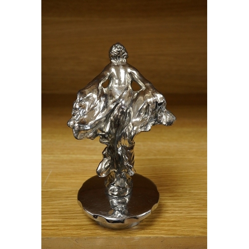 379 - A Sykes style chromed car mascot in the form of an Art Deco woman with flowing gown, indistinctly si... 