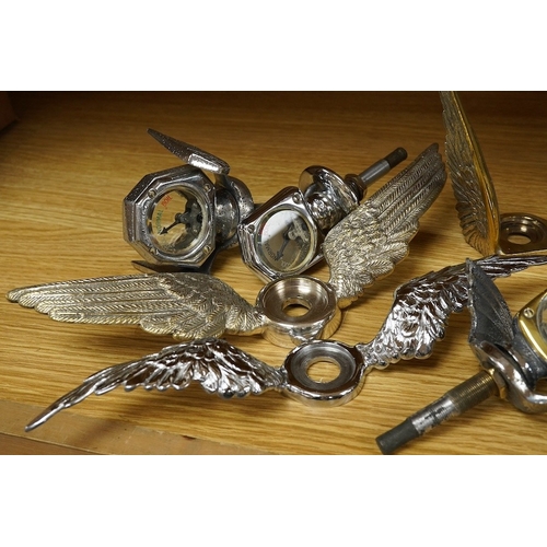 381 - Four car mascot Calormeters by Wilmot-Breeden, three examples with winged bases, together with three... 