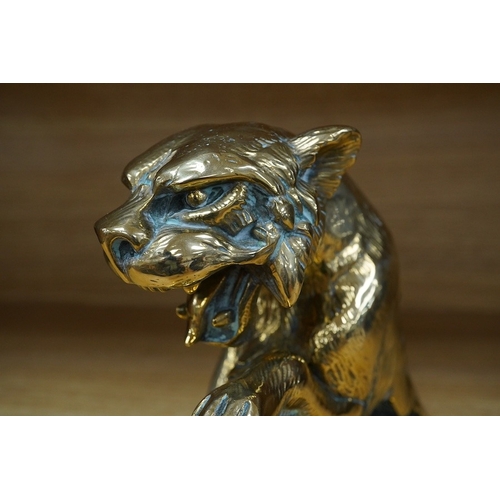 382 - A substantial brass car mascot of the front half of a big cat roaring, mounted on a sheet of brass, ... 