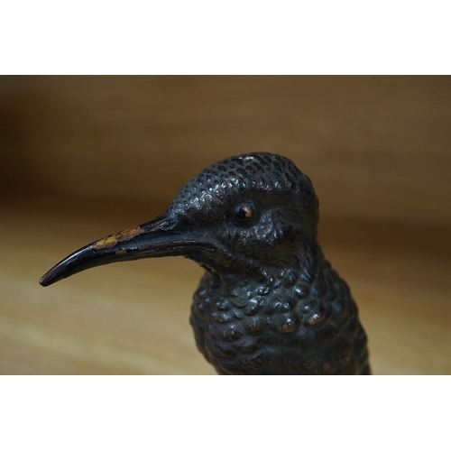 384 - A cold painted bronze car mascot in the form of a kingfisher mounted on a circular socle, 12.5cm hig... 