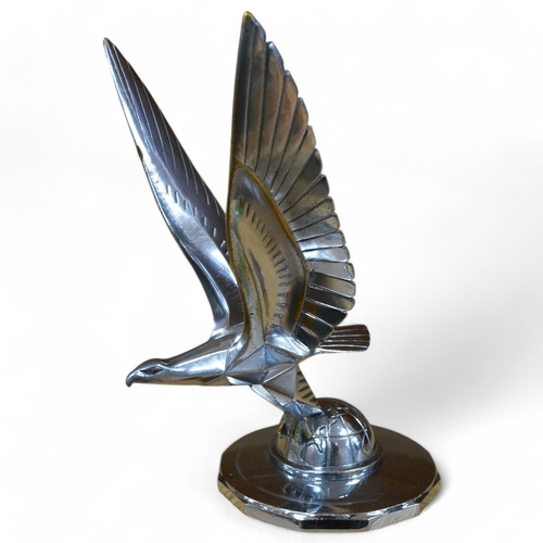 385 - A 1920s/30s French Art Deco eagle on a globe car mascot by Casimir Brau for the car manufacturer M... 