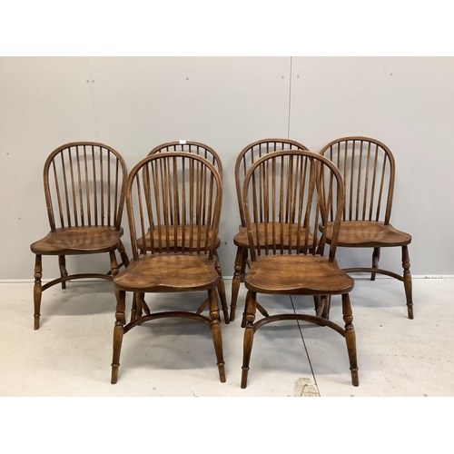 39 - A set of six oak Windsor comb back dining chairs with crinoline stretchers, width 48cm, depth  43cm,... 