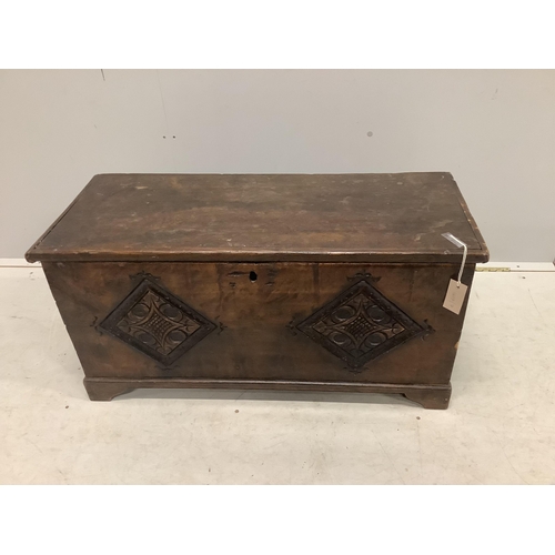 40 - A small 17th century style carved fruitwood six plank coffer, width 91cm, depth 38cm, height 46cm. C... 