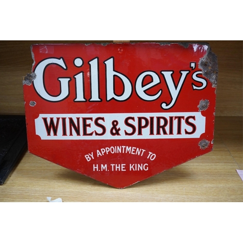 402 - A 1930's double sided Gilbey's Wines & Spirits enamel sign, 41.5cm high. Condition - as per online i... 