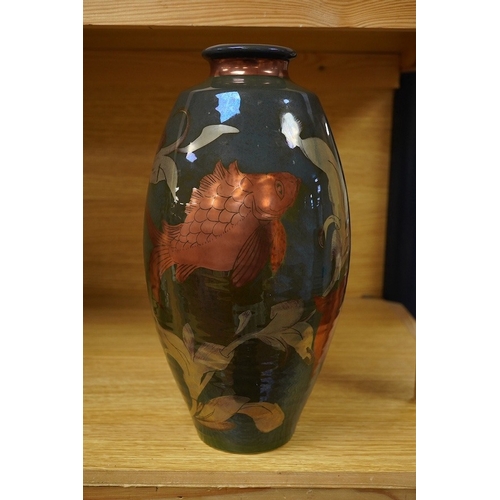 404 - A Jonathan Chiswell Jones lustre vase hand painted with carp, signed to the base, 30cm high. Conditi... 