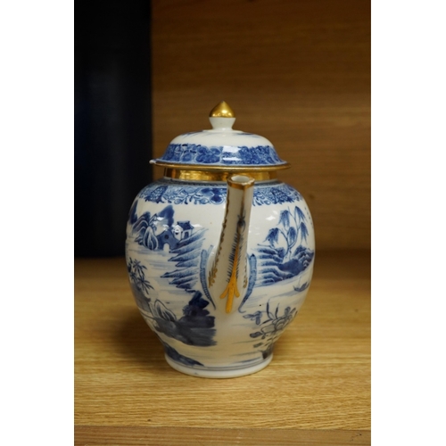 412 - A Chinese export blue and white teapot, c.1790, painted with pagodas, 24cm wide. Condition - some ch... 