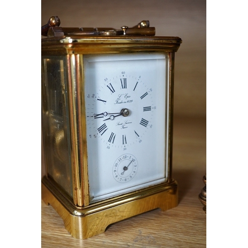 419 - A French brass repeating carriage clock, together with another enamelled dial carriage clock, both w... 