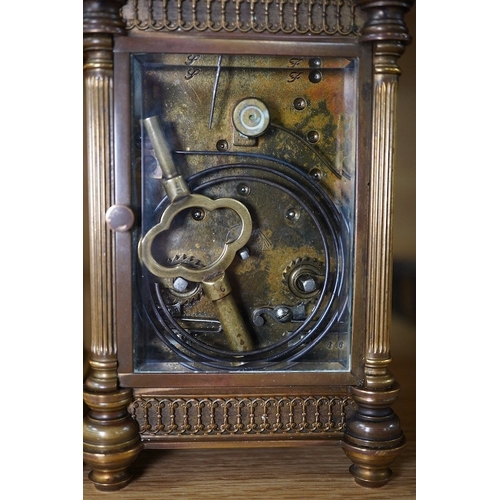 419 - A French brass repeating carriage clock, together with another enamelled dial carriage clock, both w... 