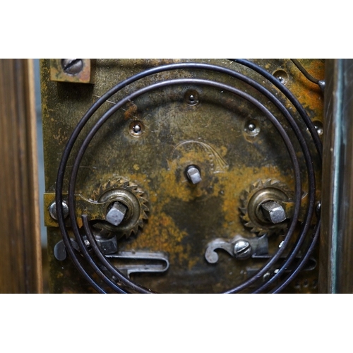 419 - A French brass repeating carriage clock, together with another enamelled dial carriage clock, both w... 