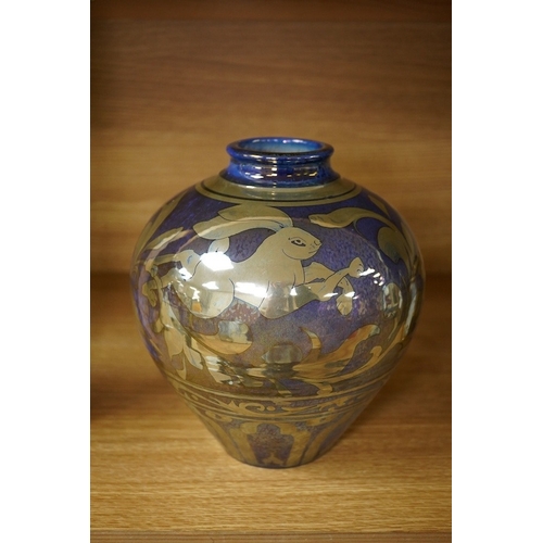 420 - A Jonathan Chiswell Jones lustre vase with hare decoration, 21.5cm. Condition - good