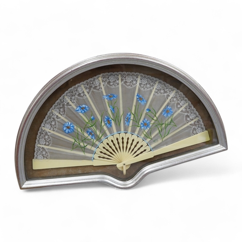 425 - A 20th century silver painted fan case housing a hand painted floral and machine lace fan, case 40cm... 