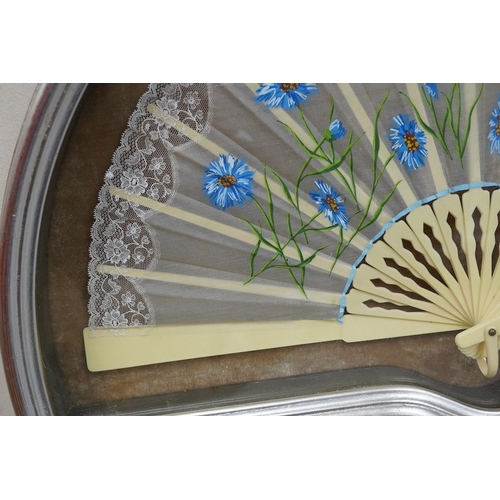 425 - A 20th century silver painted fan case housing a hand painted floral and machine lace fan, case 40cm... 