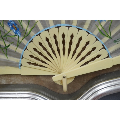 425 - A 20th century silver painted fan case housing a hand painted floral and machine lace fan, case 40cm... 