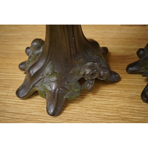 428 - A pair of French patinated spelter floral painted Art Nouveau two branch, three light candelabra, 40... 