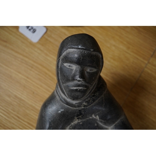 430 - A large Inuit figurative carving, the base signed JOSHPIE, 40cm deep, 20cm wide. Condition - small c... 