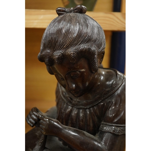 442 - A carved wood bust of a girl sewing, 47cm high. Condition - two old cracks to the back of carving... 