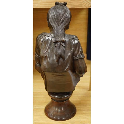 442 - A carved wood bust of a girl sewing, 47cm high. Condition - two old cracks to the back of carving... 