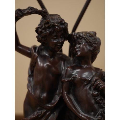 449 - After Auguste Moreau (1834-1917), a bronzed resin figural table lamp, 75cm. Condition - good, not te... 