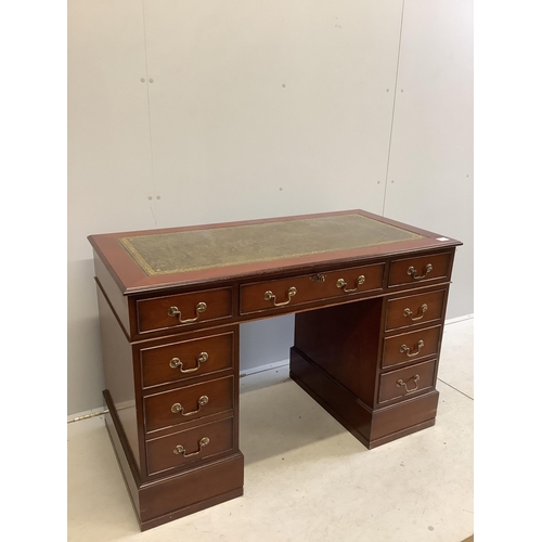 45 - A George III style mahogany pedestal desk, fitted with nine small drawers, width 121cm, depth 60cm, ... 