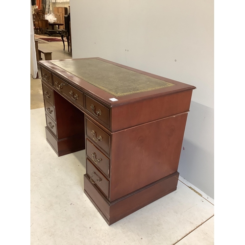 45 - A George III style mahogany pedestal desk, fitted with nine small drawers, width 121cm, depth 60cm, ... 