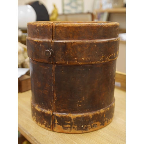 461 - A 19th century leather fire bucket decorated with the Royal armorials, 36cm high. Condition - fair, ... 