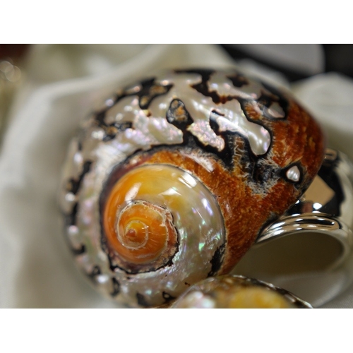 462 - Hans Turnwald, three boxed sets of modernist shell and plated napkin rings in the form of snails. Co... 