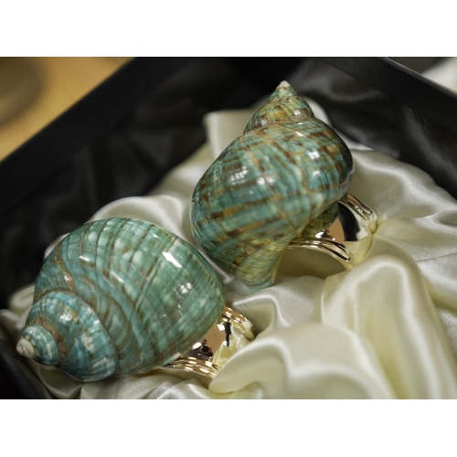 462 - Hans Turnwald, three boxed sets of modernist shell and plated napkin rings in the form of snails. Co... 