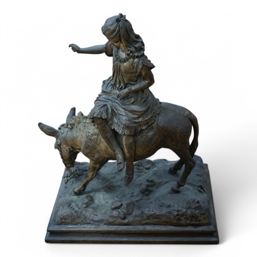 464 - A silvered resin figure of a girl on a donkey, 45cm high. Condition - poor