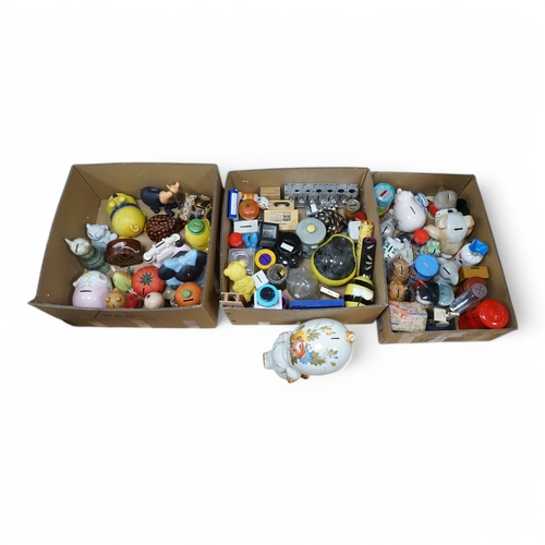 466 - Three boxes of mixed novelty pottery, plastic and metal and wooden money boxes, largest 26cm high. C... 