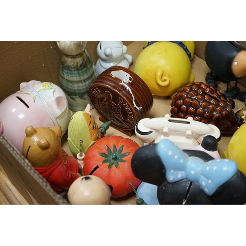 466 - Three boxes of mixed novelty pottery, plastic and metal and wooden money boxes, largest 26cm high. C... 