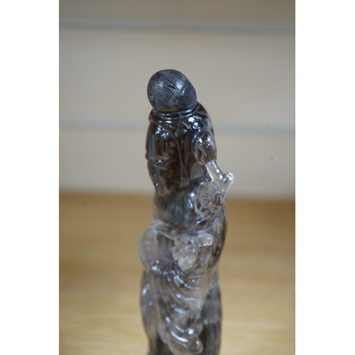 471 - A Chinese smoky quartz figure of Guanyin, 23cm. Condition - fair to good