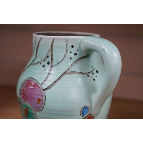 472 - A Clarice Cliff passion fruit decorated small lotus jug, 19.5cm. Condition - good