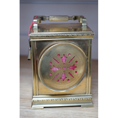 474 - A late 19th century French brass large carriage clock with convex enamel dial, retailed by Robinson ... 