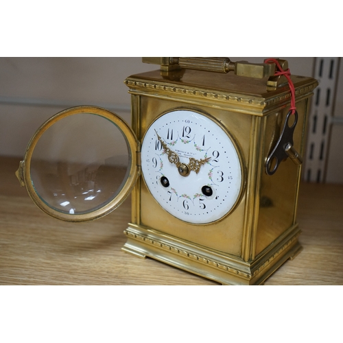 474 - A late 19th century French brass large carriage clock with convex enamel dial, retailed by Robinson ... 